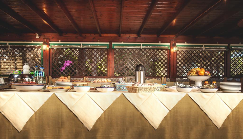 Hotel Fiore Di Maggio Вилласимиус Экстерьер фото