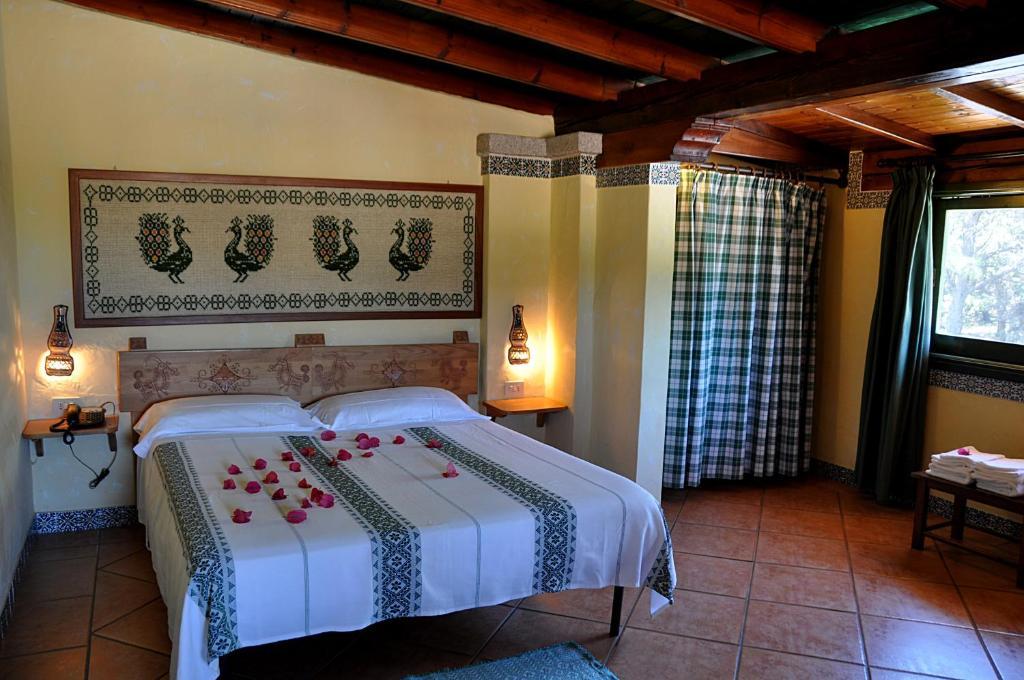 Hotel Fiore Di Maggio Вилласимиус Номер фото